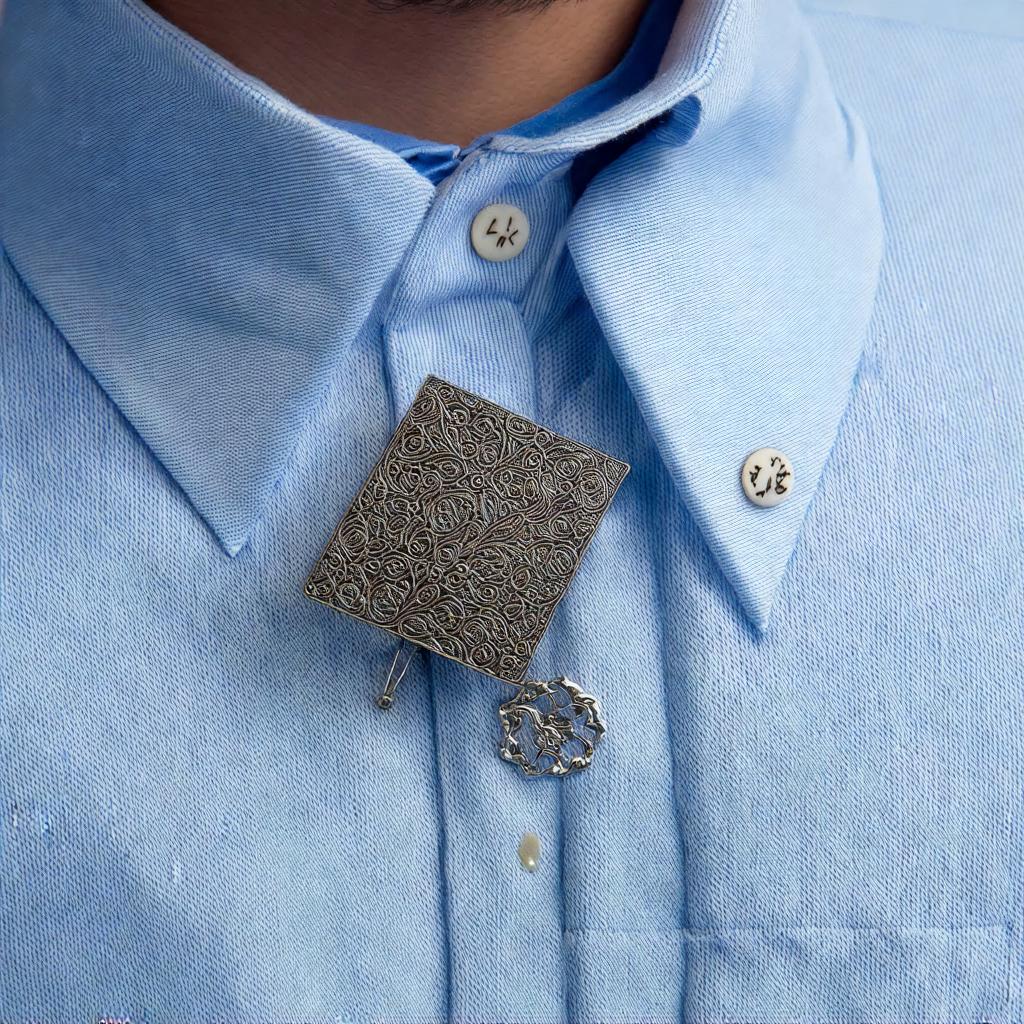 - Understanding the Traditional Rules of Lapel Pin Placement