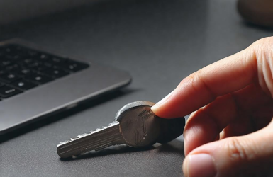 How to put keys on keychain?